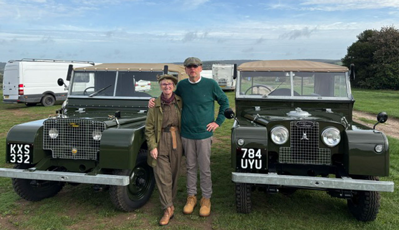 Photo of Mat and Kate at Goodwood with their two vintage Land Rovers